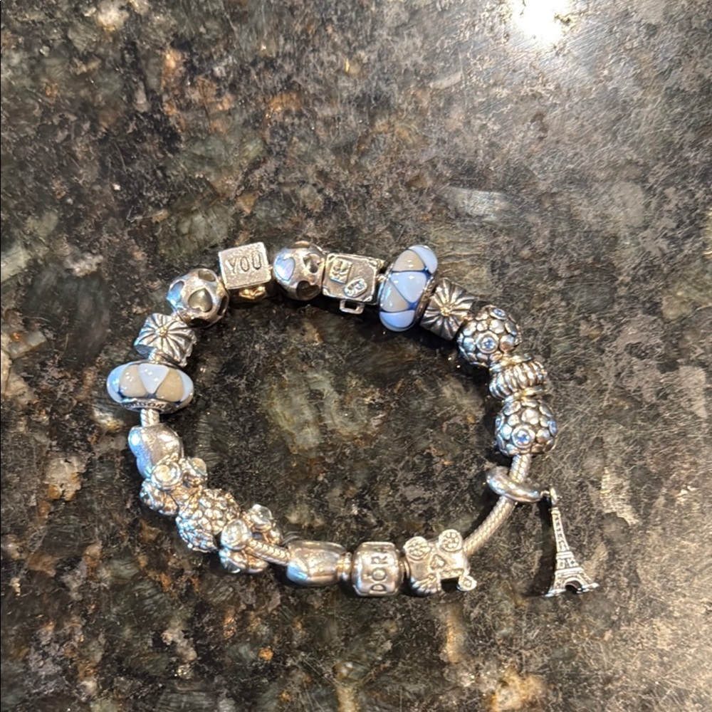 Pandora Authentic full of retired charms